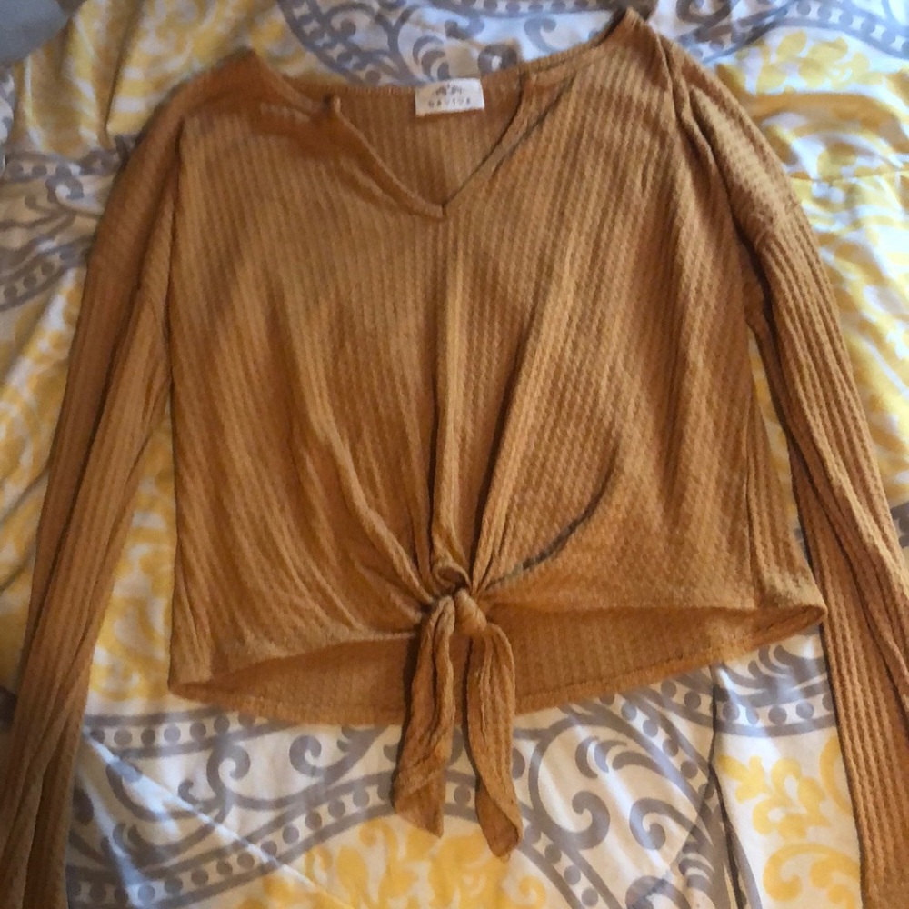 yellow long sleeve shirt